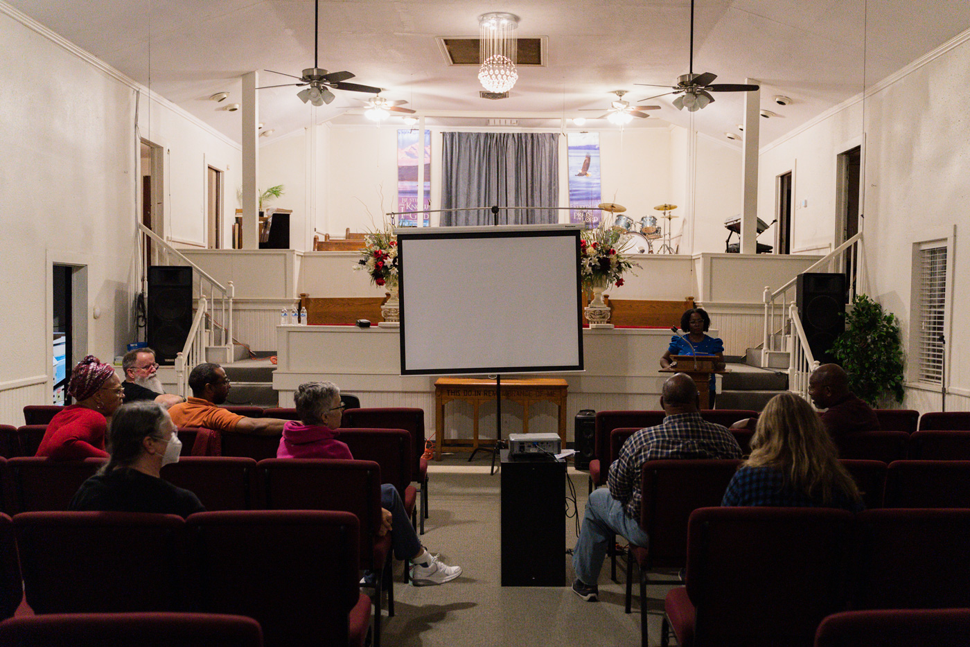 People gather at a church to talk about justice.