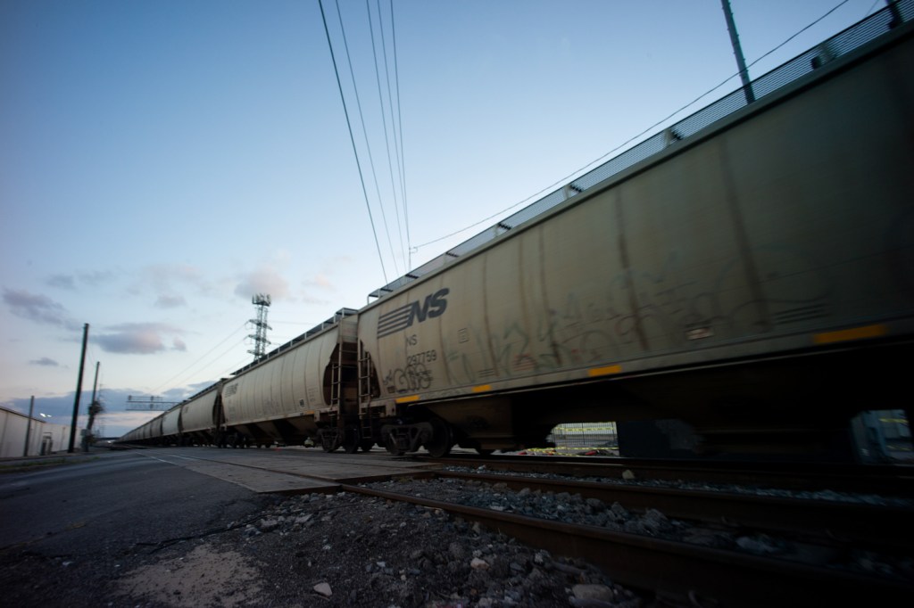 A train passes over a boulevard