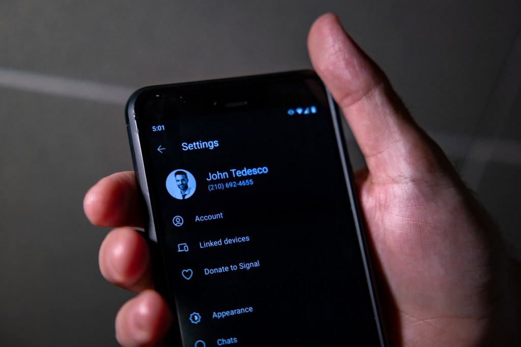 Person holds cellphone