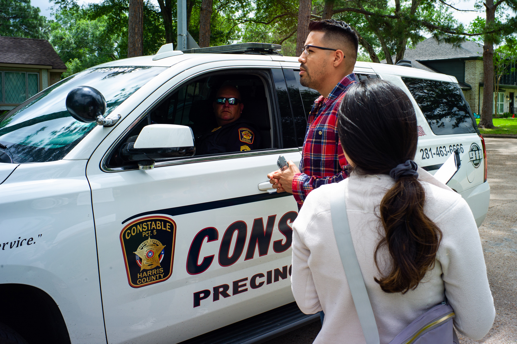 David Lopez speaks to a Harris County Constable