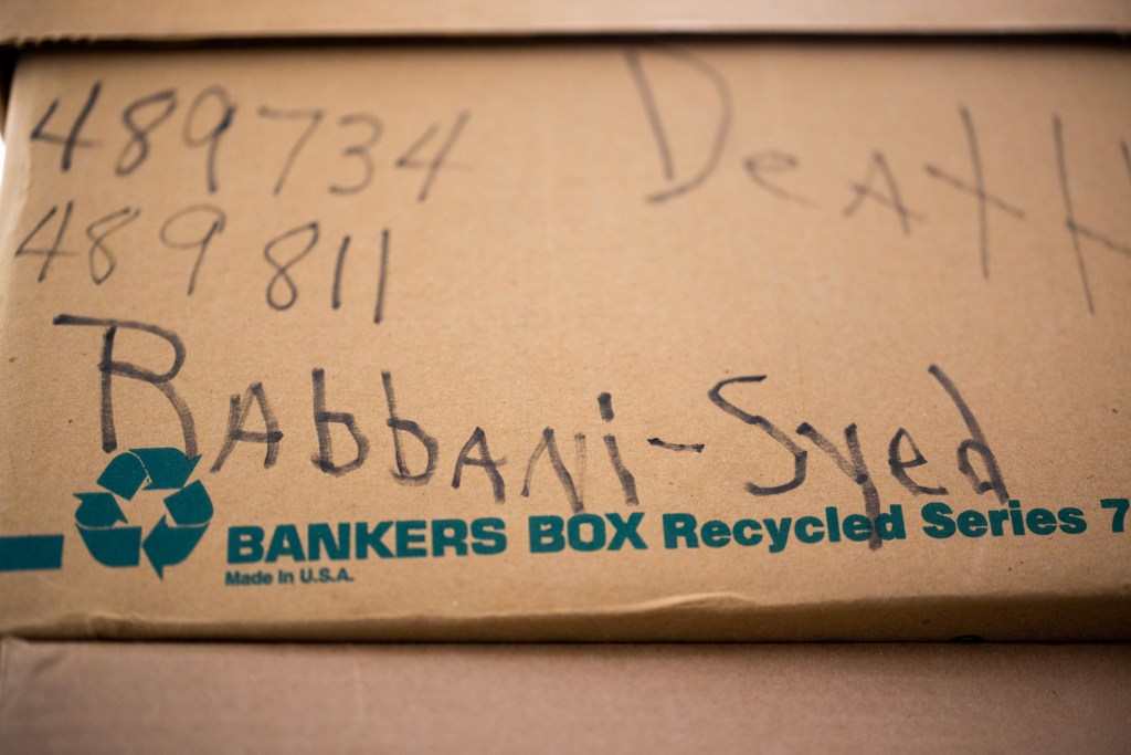 A box filled with files regarding Syed Rabbani’s case