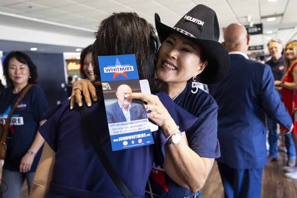 Helen Chang hugs a fellow supporter of John Whitmire at a kick-off event for his mayoral campaign at Minute Maid Park on Saturday, June 10, 2023, in Houston