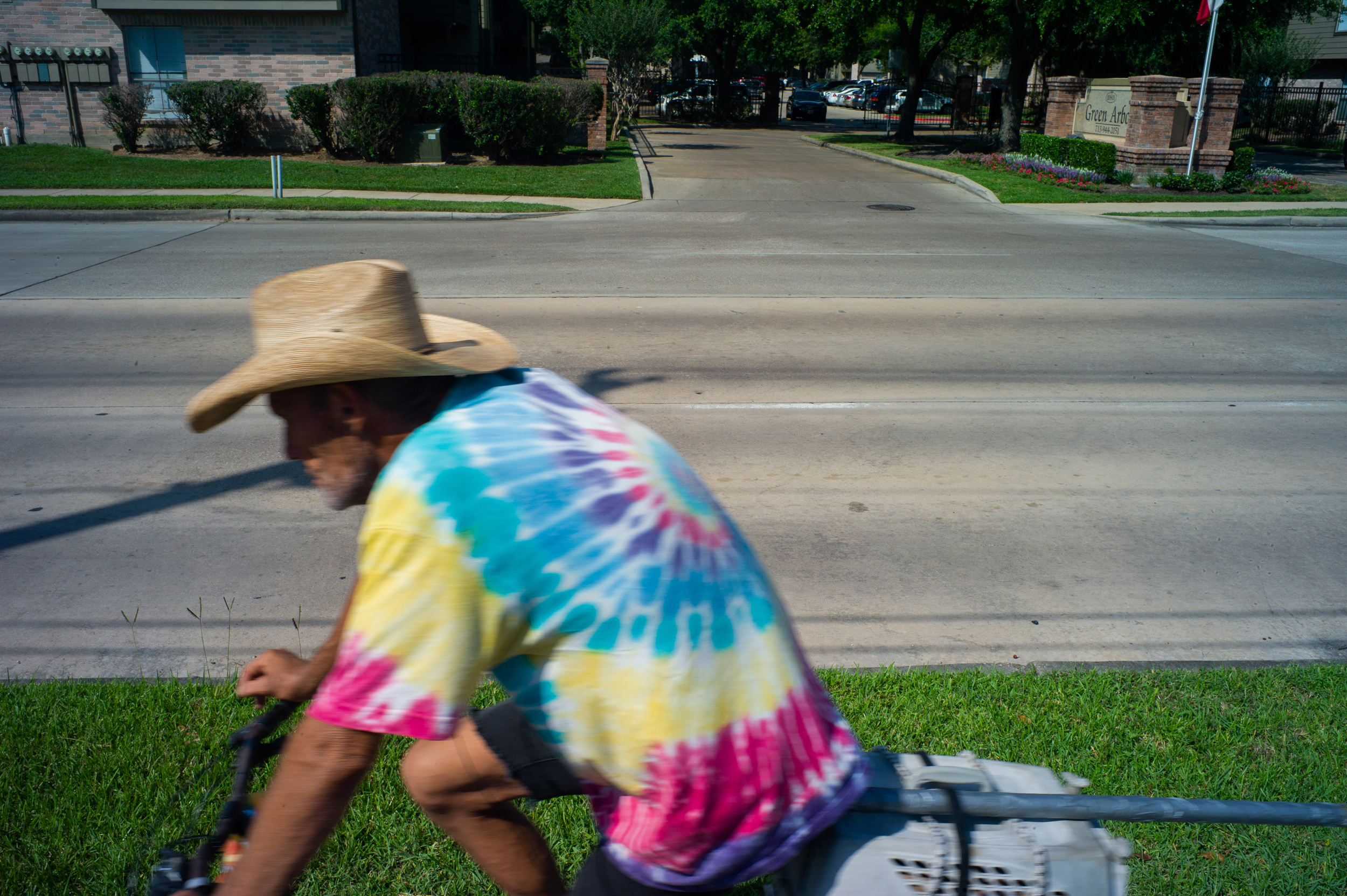 Photo of the road with worn out road stripes making it hard to see the road stripes