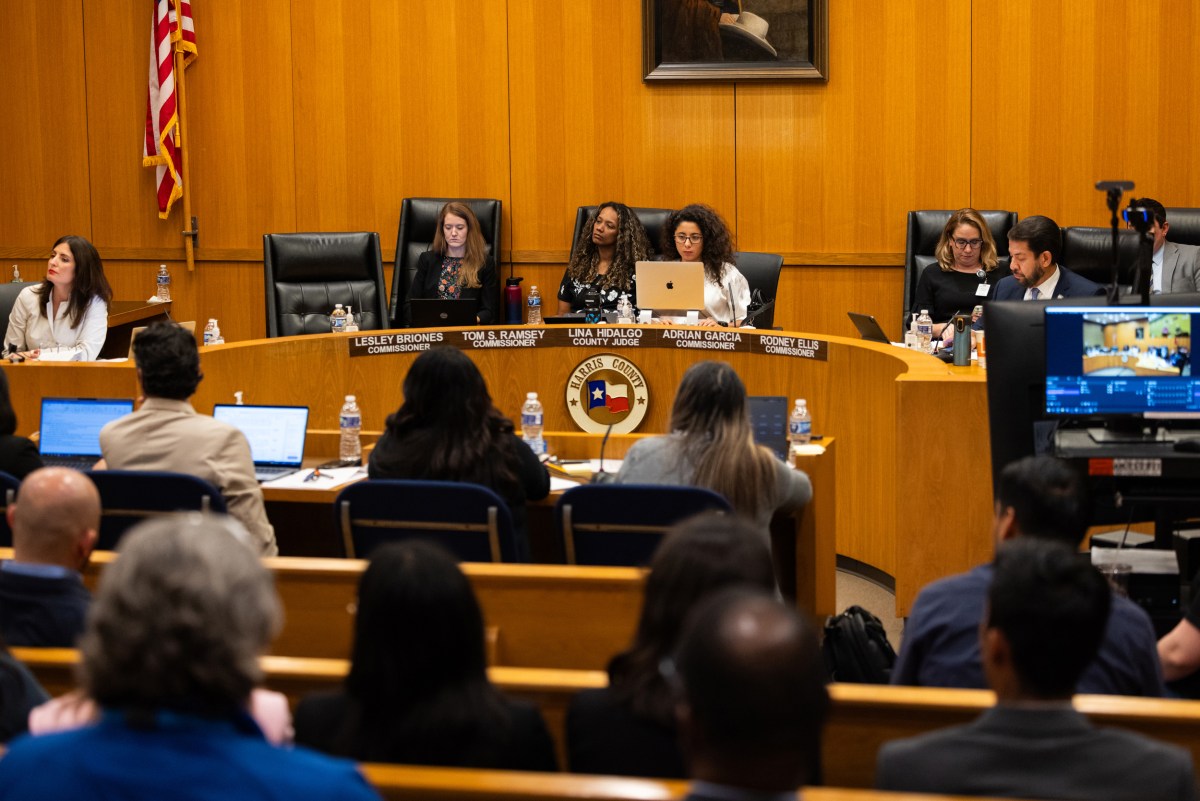 Harris County Commissioner Lesley Briones, Harris County Judge Lina Hidalgo and Commissioner Adrian Garcia attend a Harris County Commissioners Court meeting in Houston.