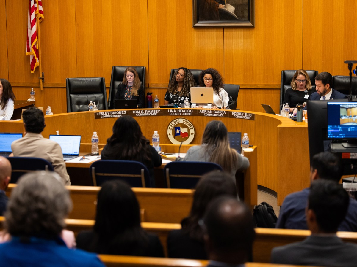 Harris County Commissioner Lesley Briones, Harris County Judge Lina Hidalgo and Commissioner Adrian Garcia attend a Harris County Commissioners Court meeting in Houston.