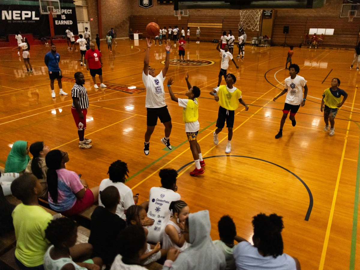 Children play basketball at a tournament in Houston
