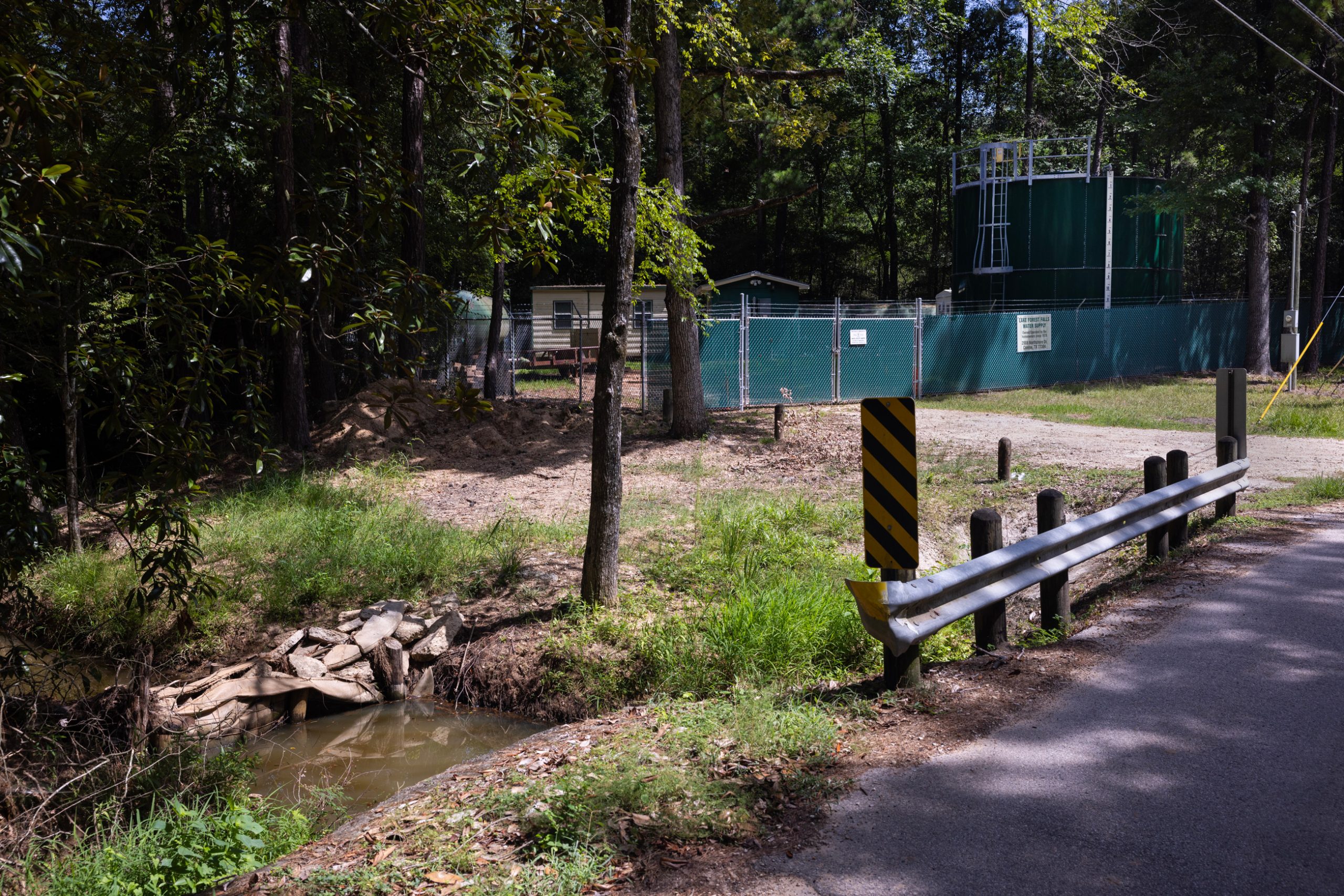 A silt retention testing unit sits in Base Creek