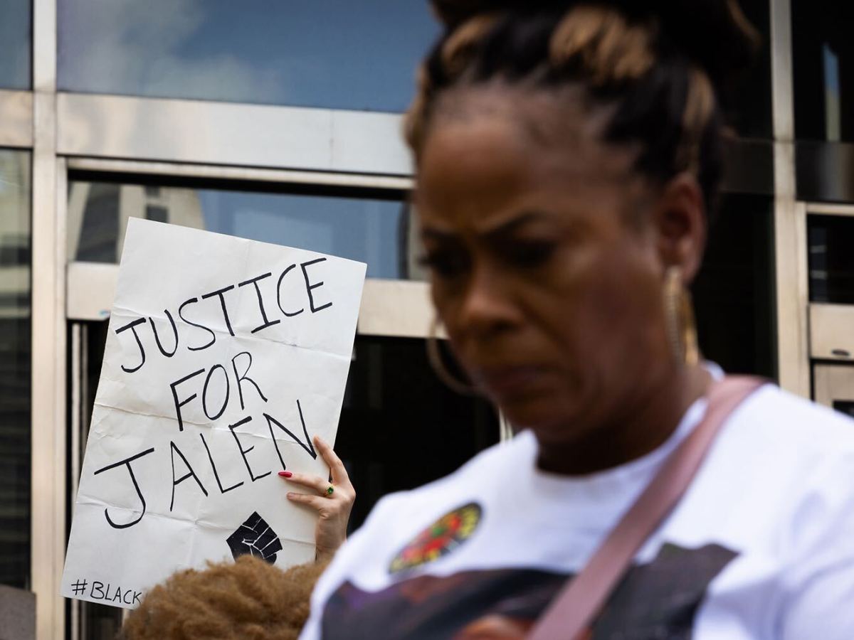 A sign demanding justice for Jalen Randle, the 29-year-old shot and killed by a Houston Police Department officer in April 2022, is displayed at a rally.