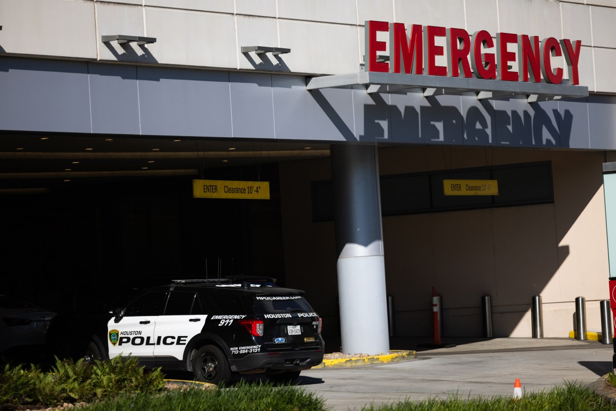 A Houston Police Department patrol vehicle is parked at Memorial Hermann-Texas Medical Center, where a Harris County sheriff's deputy was receiving medical care after he was shot
