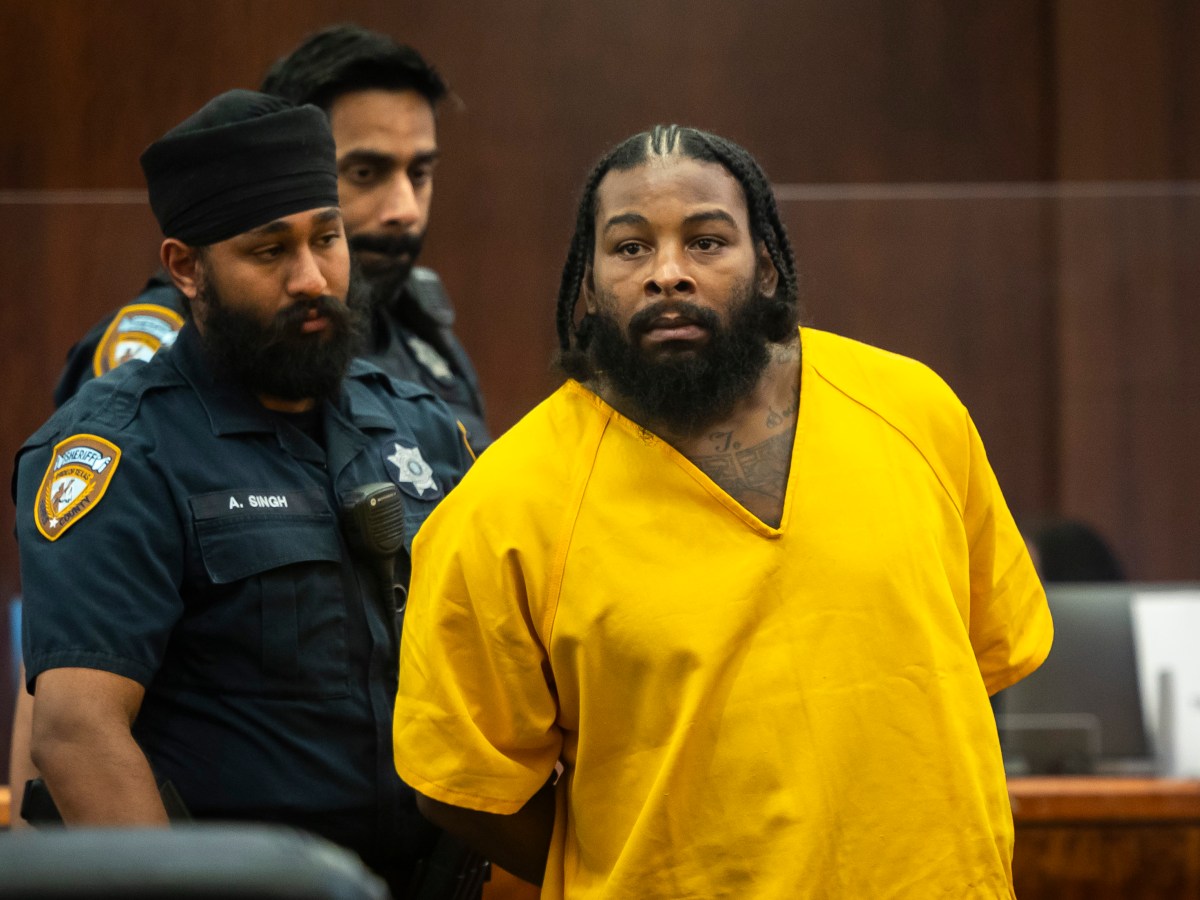 Terran Green, who faces four charges of attempted murder of a peace officer, appears in court Monday at the Harris County Criminal Justice Center in downtown Houston.
