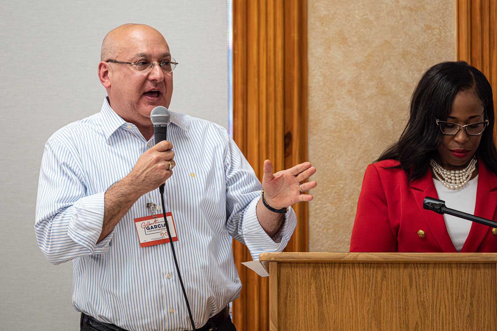 Mayoral candidate Gilbert Garcia answers a question during a forum for mayoral candidates in Acres Homes