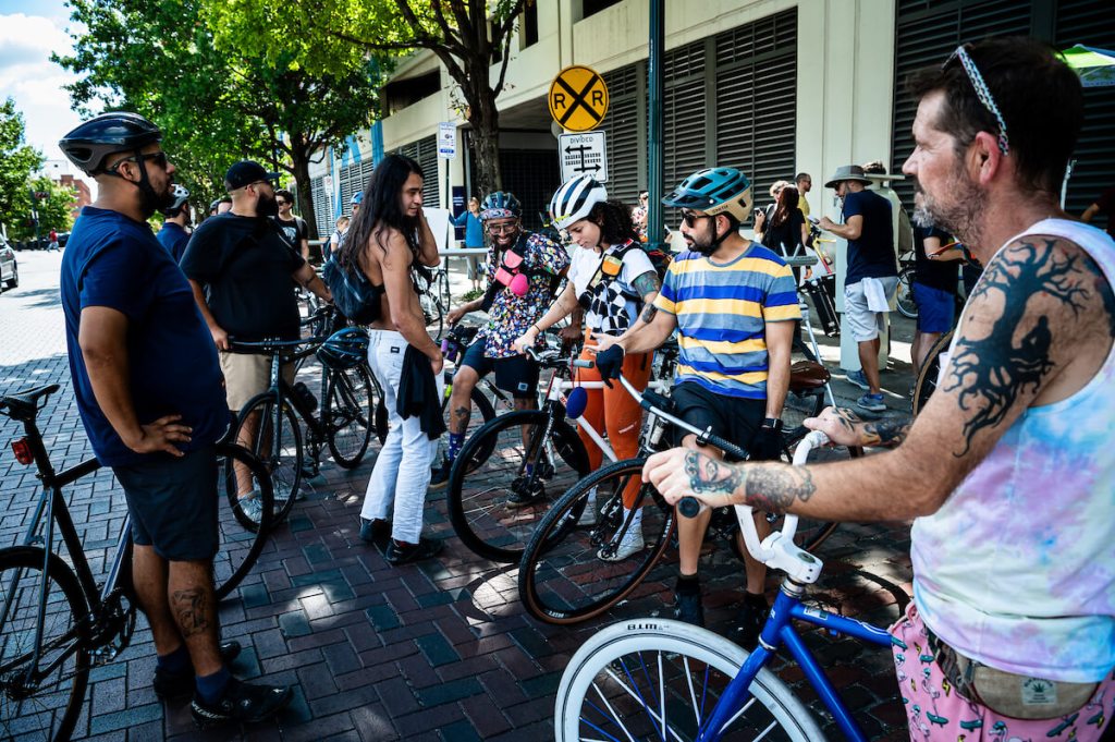 Dozens of cyclists attended a transportation forum of candidates running to be elected mayor of Houston, at the Architecture Center Houston on Saturday.