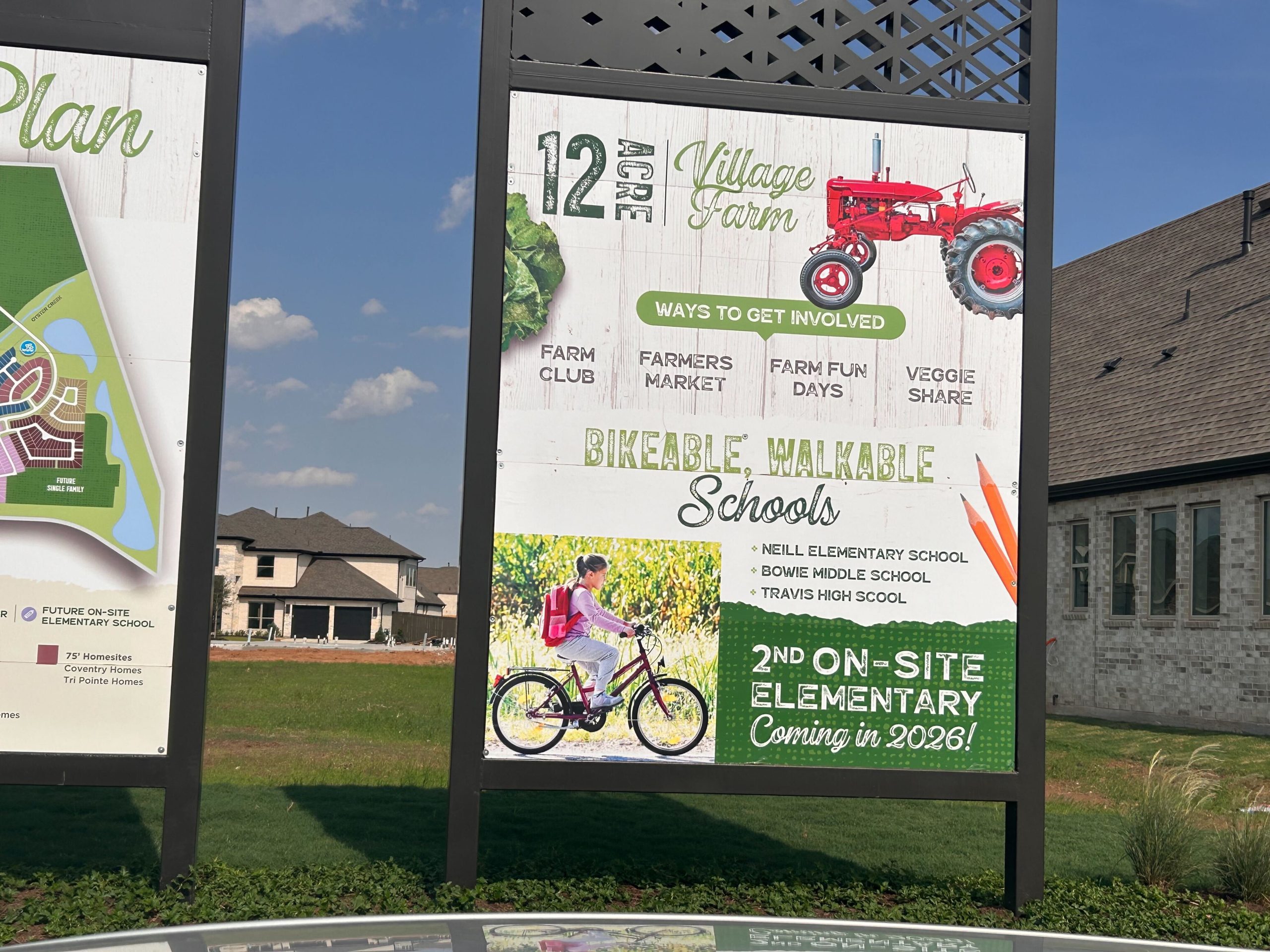 An informational plaque showing the plans for the Harvest Green community on the land of what used to be the Harlem Prison Farm in Sugar Land.