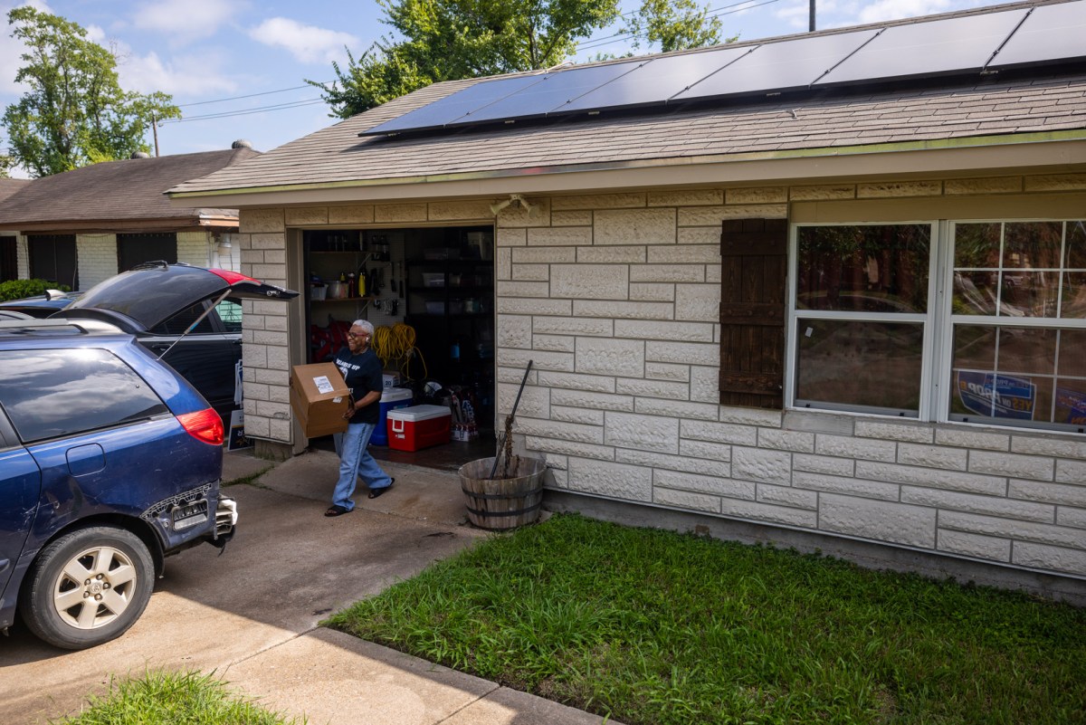 Doris Brown, co-director of West Street Recovery, loads emergency supplies into fellow cp-director Becky Selle’s truck at her home