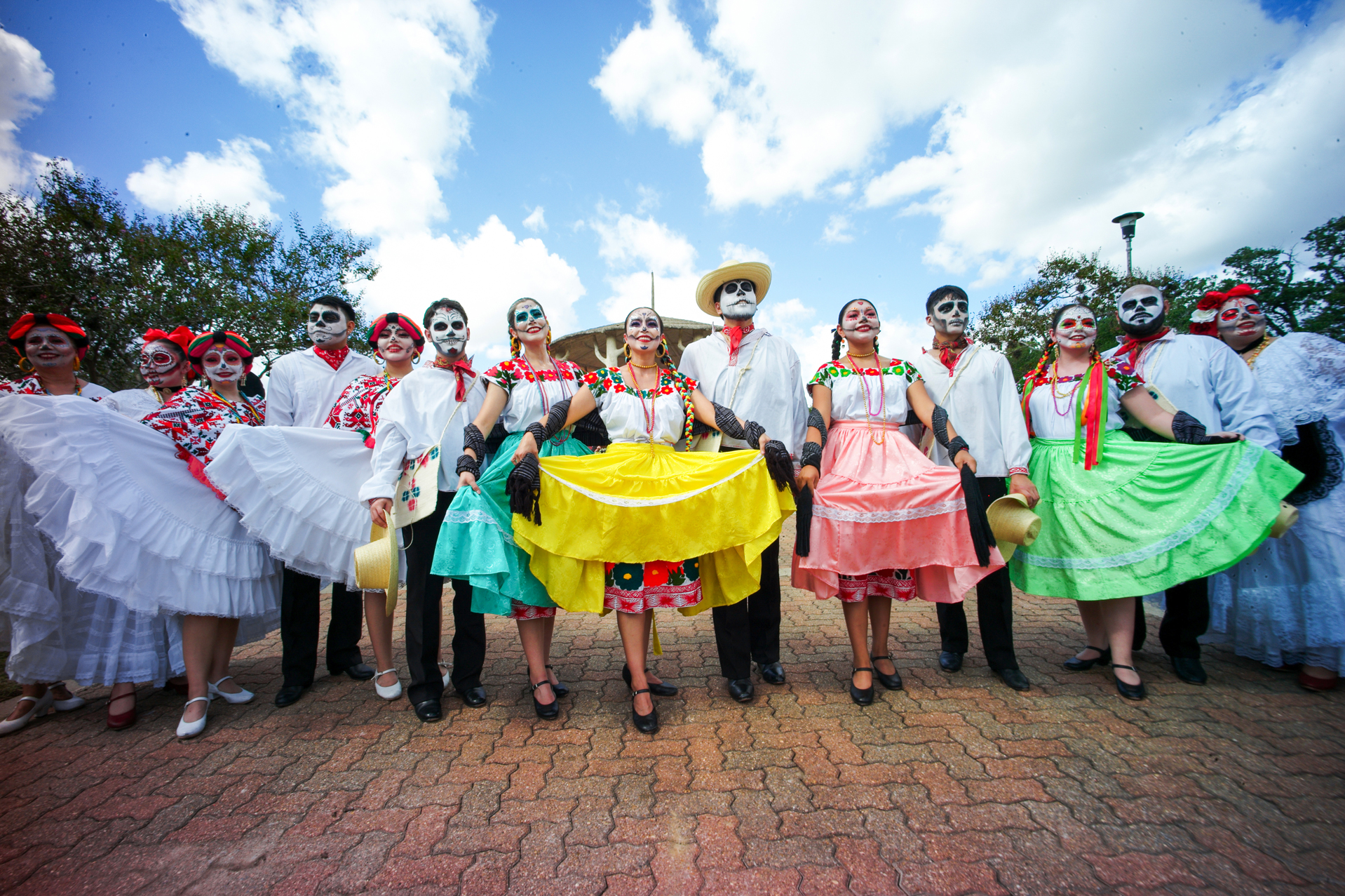Members of Ballet Folklorico Herencia Mexicana de Houston pose for festival attendees after their performance, Saturday, Oct. 28, 2023, in Houston.