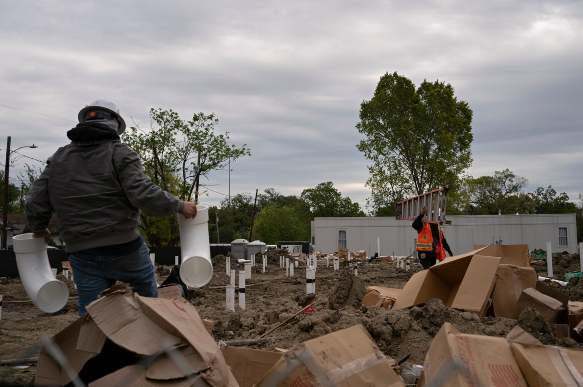 On October 31, 2023, people work on a construction site on a previously-owned Midtown Redevelopment Authority lot in a Third Ward neighborhood in Houston, Texas.