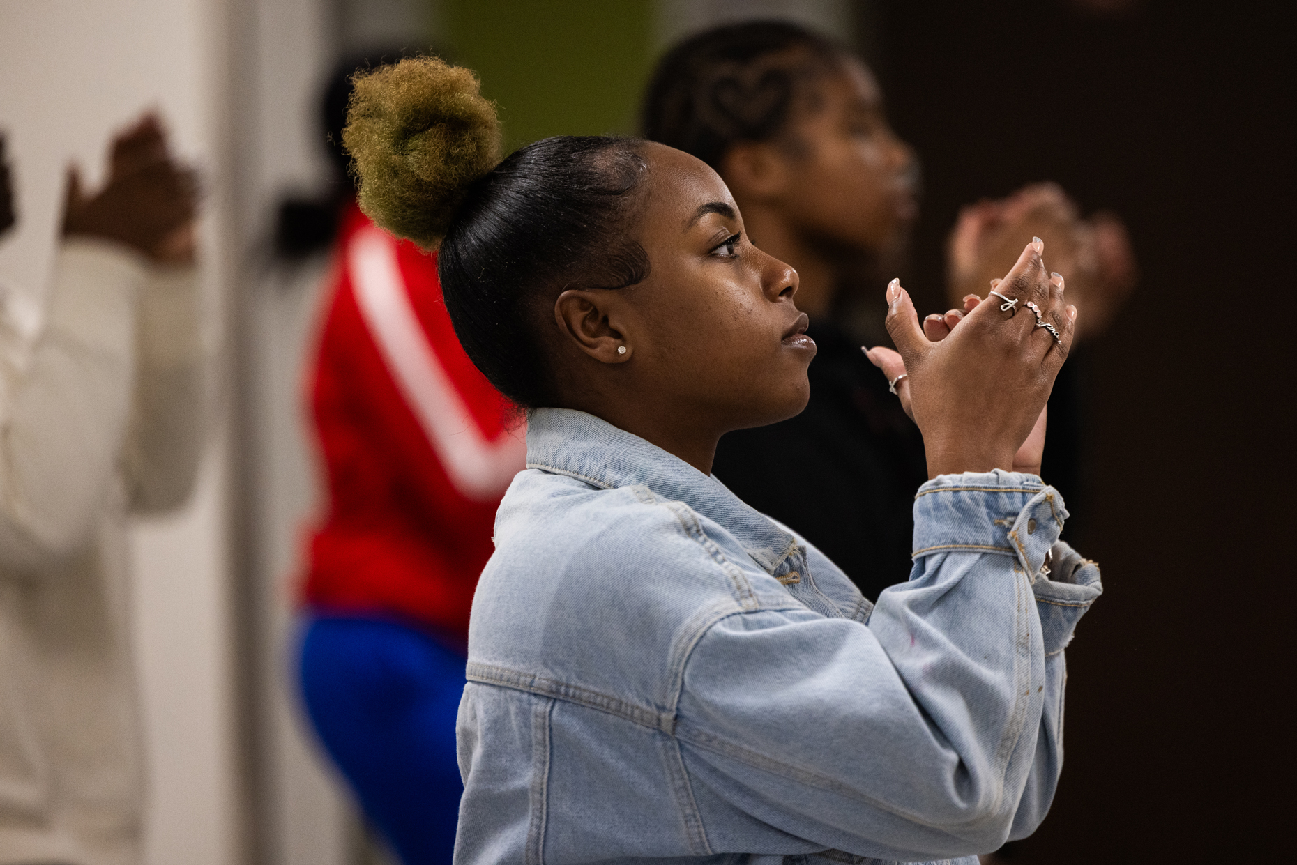 Jack Yates High School senior, student council president and captain of the cheer team Jayla London, 17, leads the cheer team during practice, Thursday, Nov. 2, 2023