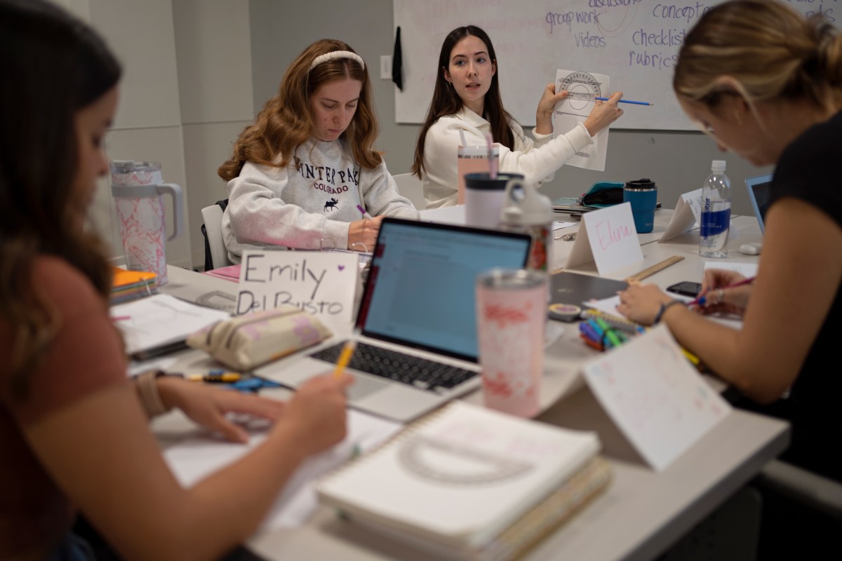 Erin Lindsey explains an exercise during a teacher-certification class with seniors at the University of Houston.