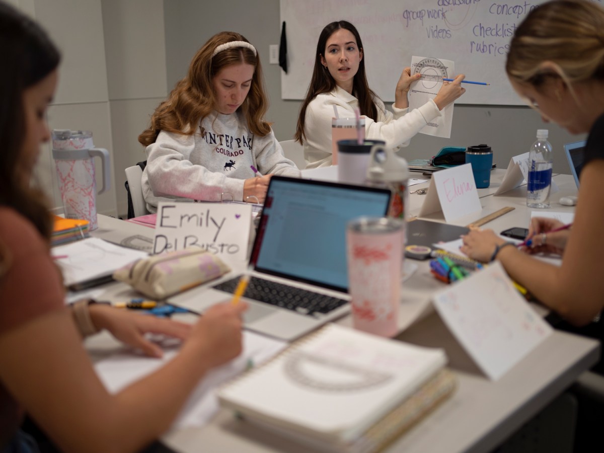 Erin Lindsey explains an exercise during a teacher-certification class with seniors at the University of Houston.