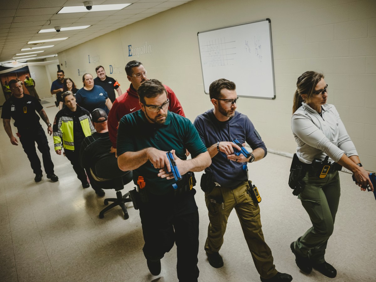 Montgomery County sheriff’s deputies and Montgomery County hospital district EMS personnel practice evacuating victims with gunshot wounds while training together on how to respond to a mass shooting, on Nov. 28, 2023 in New Caney.