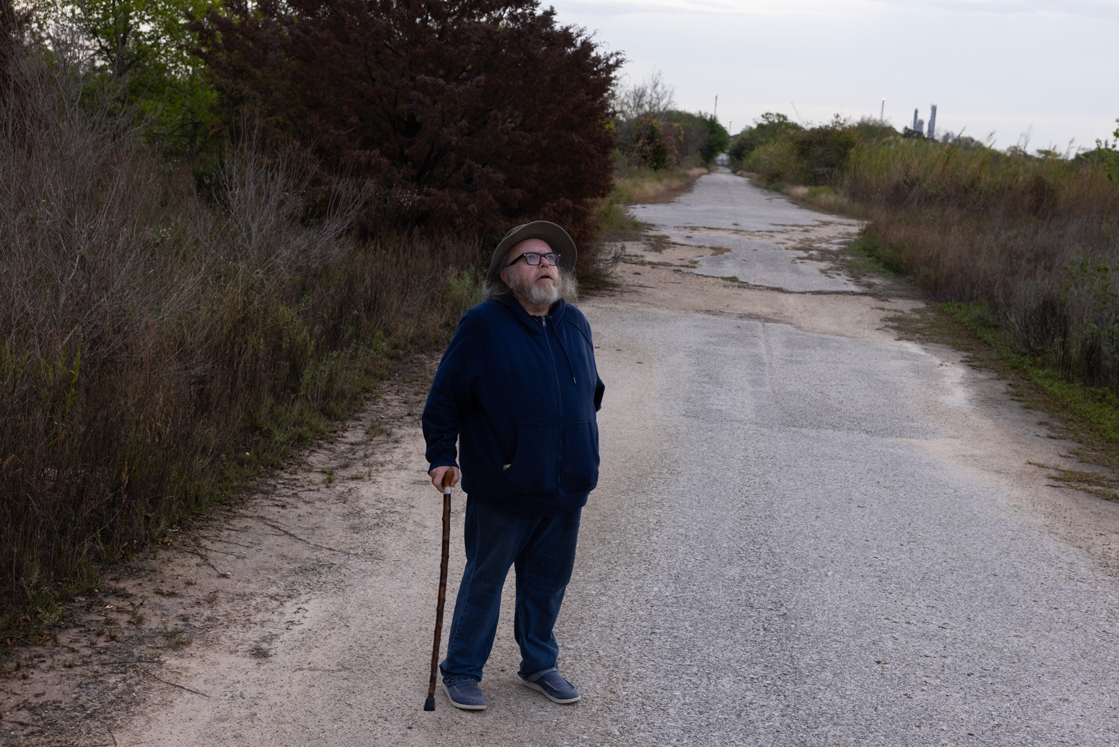 J.J. Hitt looks at the surrounding nature while taking his morning walk through Baytown Nature Center,