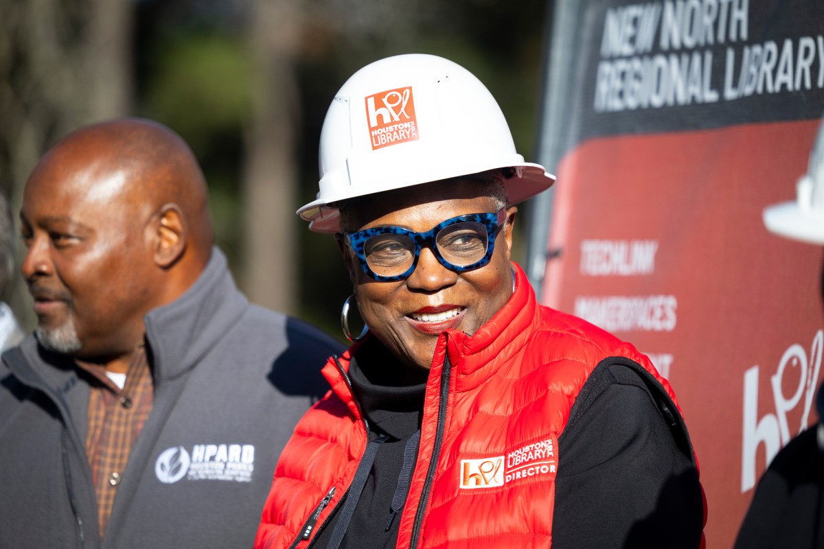 Houston Public Library director Dr. Rhea Lawson smiles with other leaders while breaking ground for the New North Regional Library on South Victory Drive during the "Mayor's Library Legacy Tour"