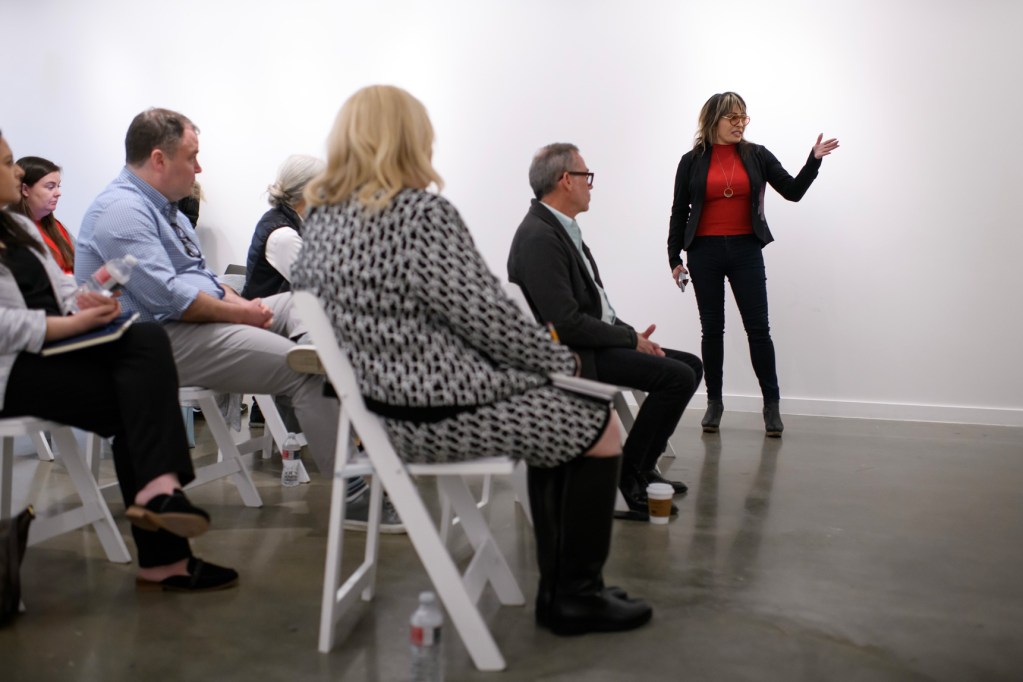 Michelle Guzman addresses the Montrose Management District board members during a meeting, Thursday, Feb. 29, 2024, in Houston.