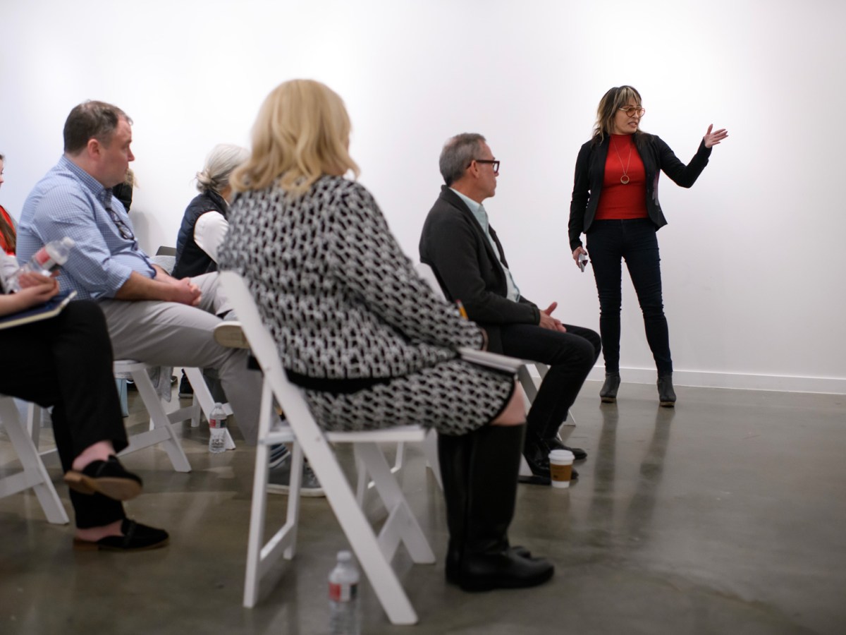 Michelle Guzman addresses the Montrose Management District board members during a meeting, Thursday, Feb. 29, 2024, in Houston.