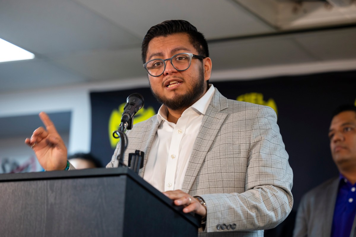 FIEL Executive Director Cesar Espinosa shares hope while cautioning listeners during a press conference about SB 4 in Houston