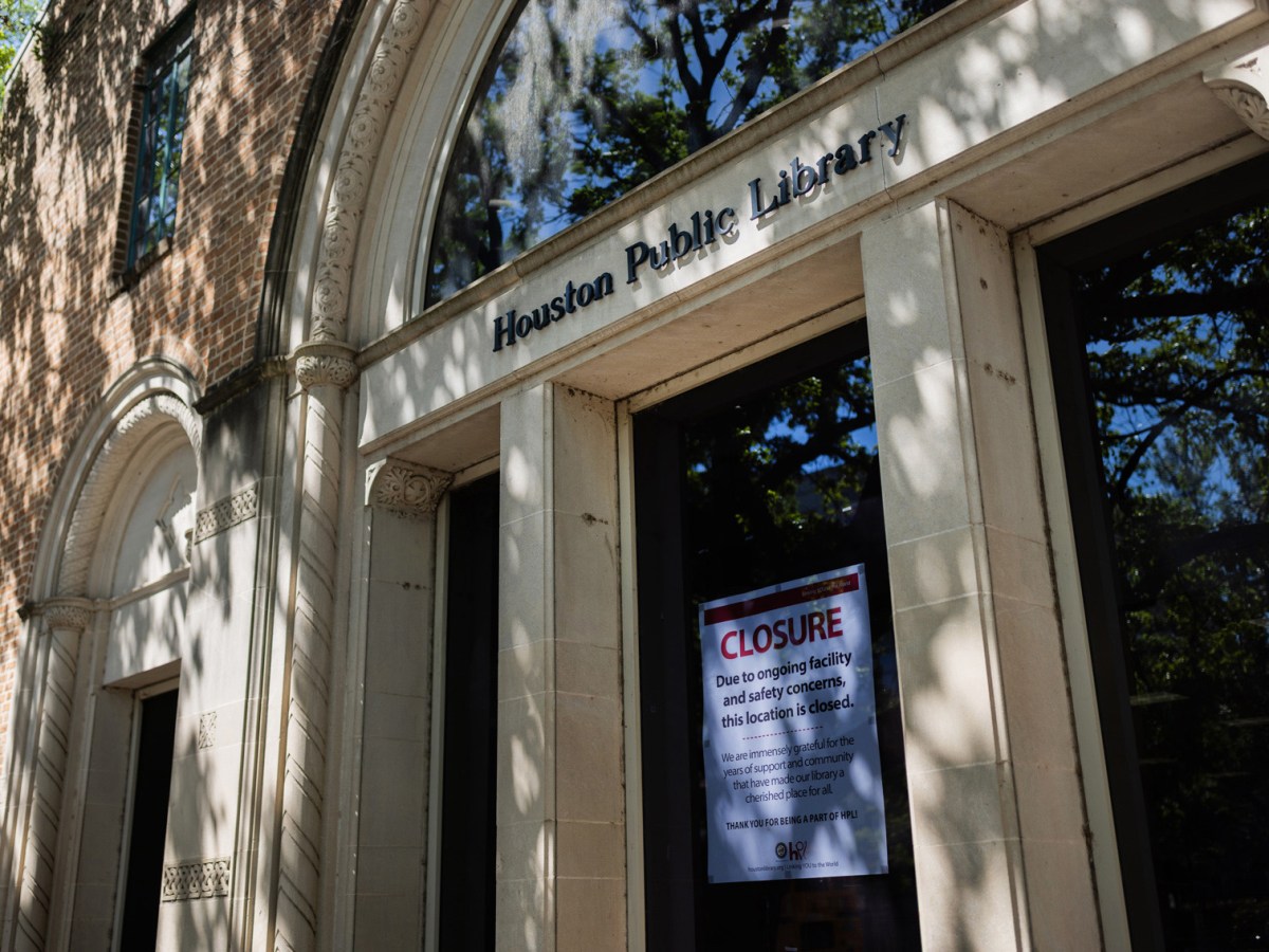 A closure sign is on the glass of the Houston Public Library’s Montrose branch, Thursday, April 11, 2024, in Houston.