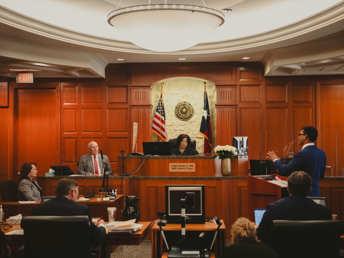 Neal Sarkar, Special Assistant Harris County Attorney, cross examines Tom Ramsey, Harris County Commissioner of Precinct 3, during a hearing on the Texas attorney general's effort to block Harris County's guaranteed income program on April 18, 2024 in the 165th District Court in Houston.