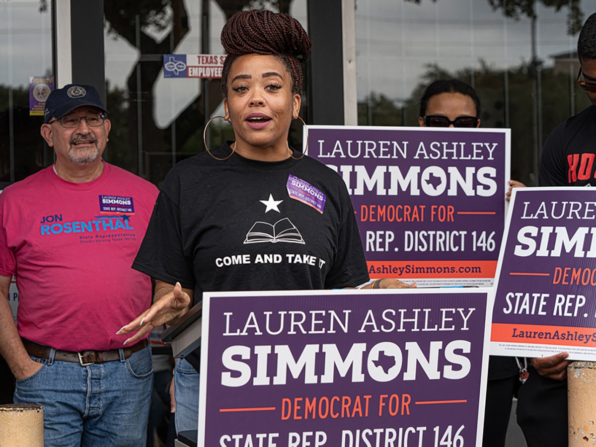 Democratic Primary Challenger Lauren Ashley Simmons addresses a crowd gathered to support her campaign ahead of a block walking event to gather more voter support on Saturday, May 11, 2024, in Houston.