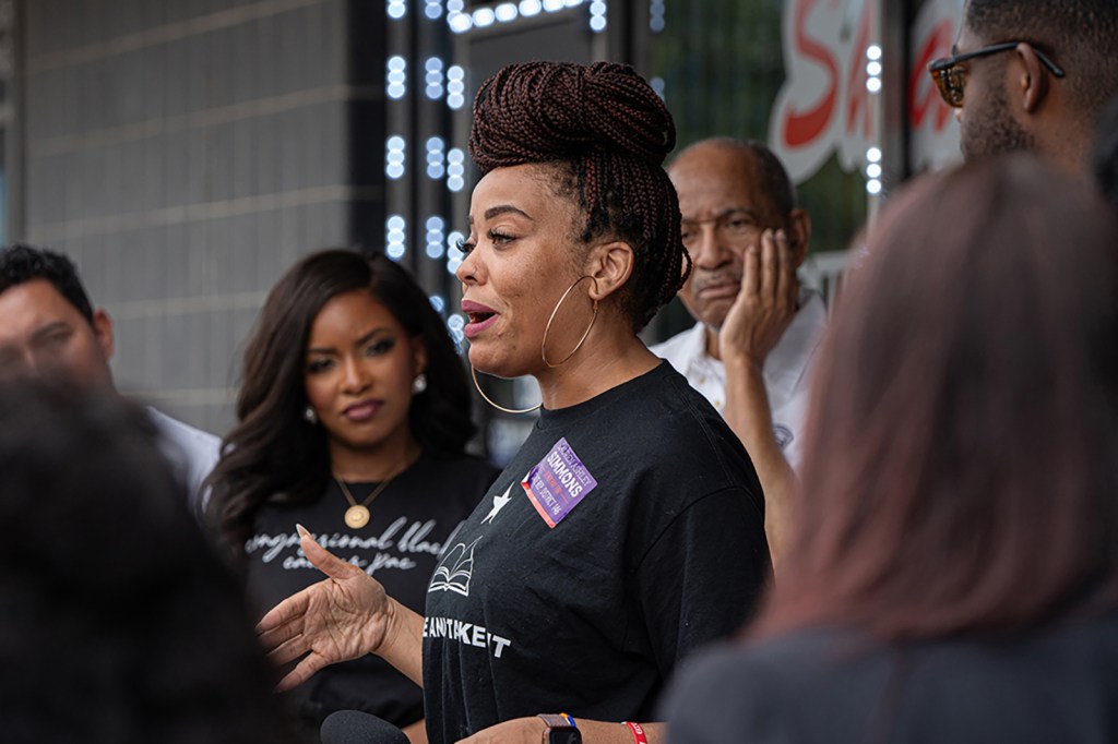 Democratic Primary Challenger Lauren Ashley Simmons addresses a crowd gathered to support her campaign ahead of a block walking event to gather more voter support on Saturday, May 11, 2024, in Houston.