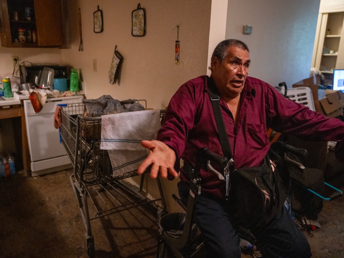 Moises Reyes, 72, of El Salvador, speaks about the sweltering living conditions during a power outage at Independence Hall, Monday, May 20, 2024, in Houston.