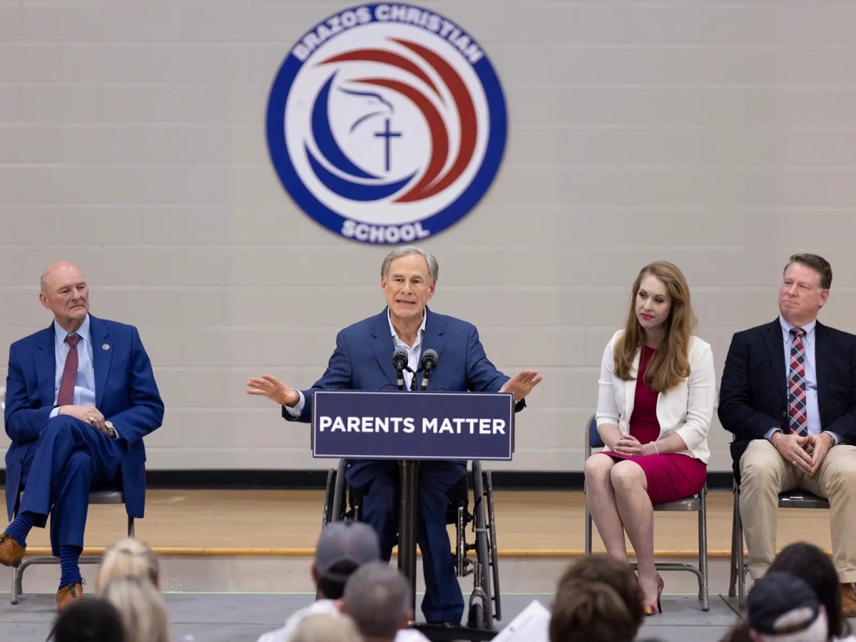 Texas Gov. Greg Abbott, center, speaks at Brazos Christian School in Bryan, Texas, on Tuesday, March 7, 2023. Abbott visited the school as a part of the Parent Empowerment Coalition's tour.