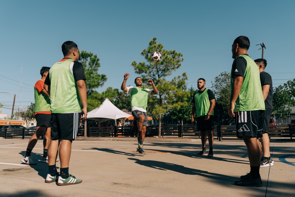 A soccer team warms up before playing