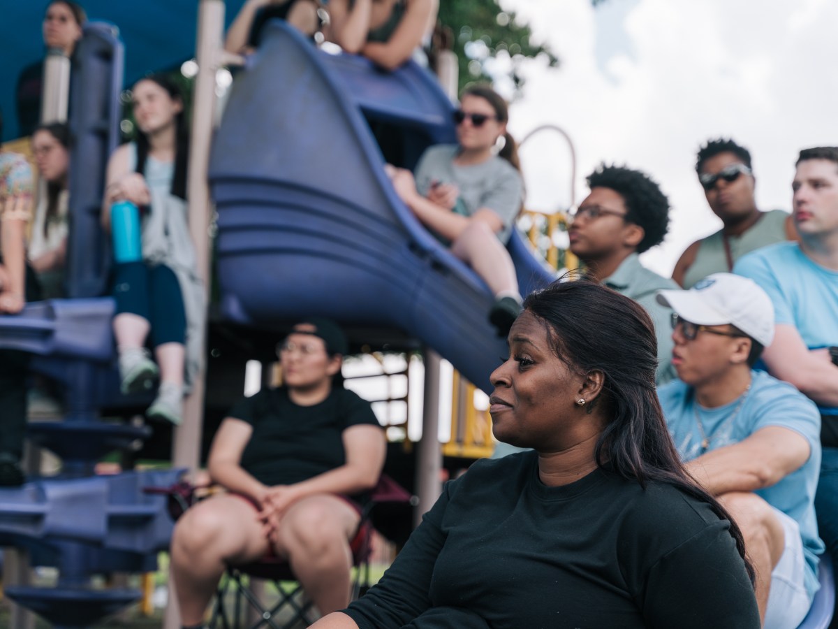 Kendra London, Fifth Ward native and community organizer, listens to Melanie Pang