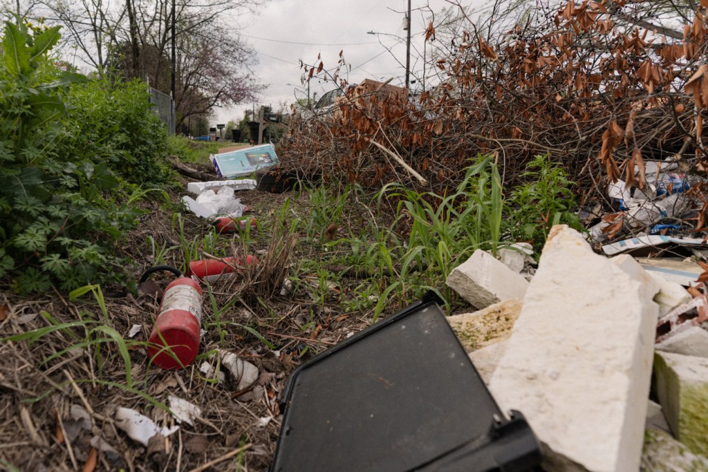 Trash dumped on the side of the road