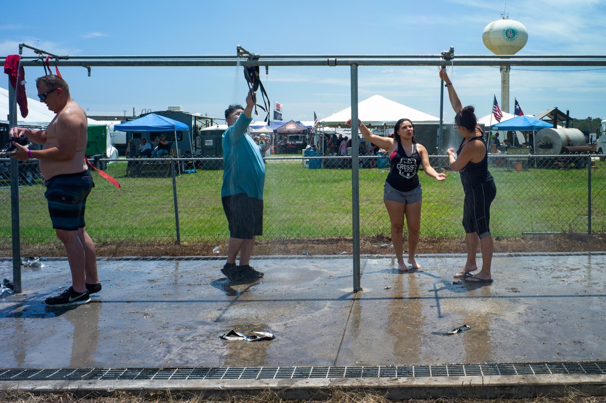 People stay cool under showers