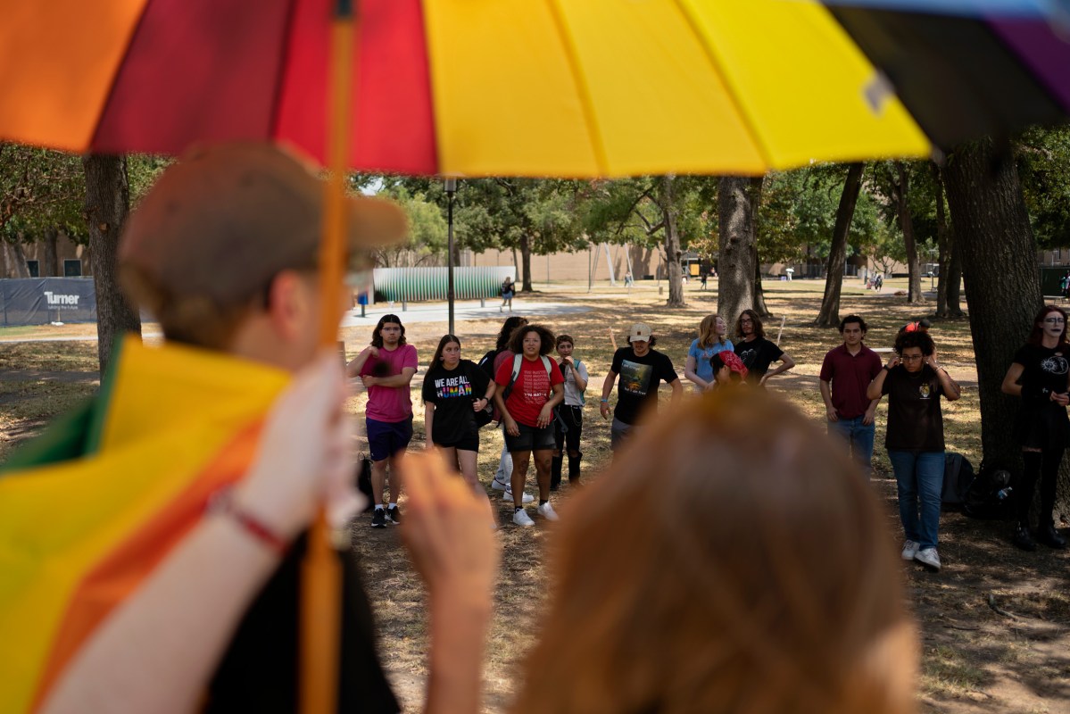 People gather at the University of Houston to protest the closure of the LGBTQ Resource Center, on August 24, 2023 in Houston.