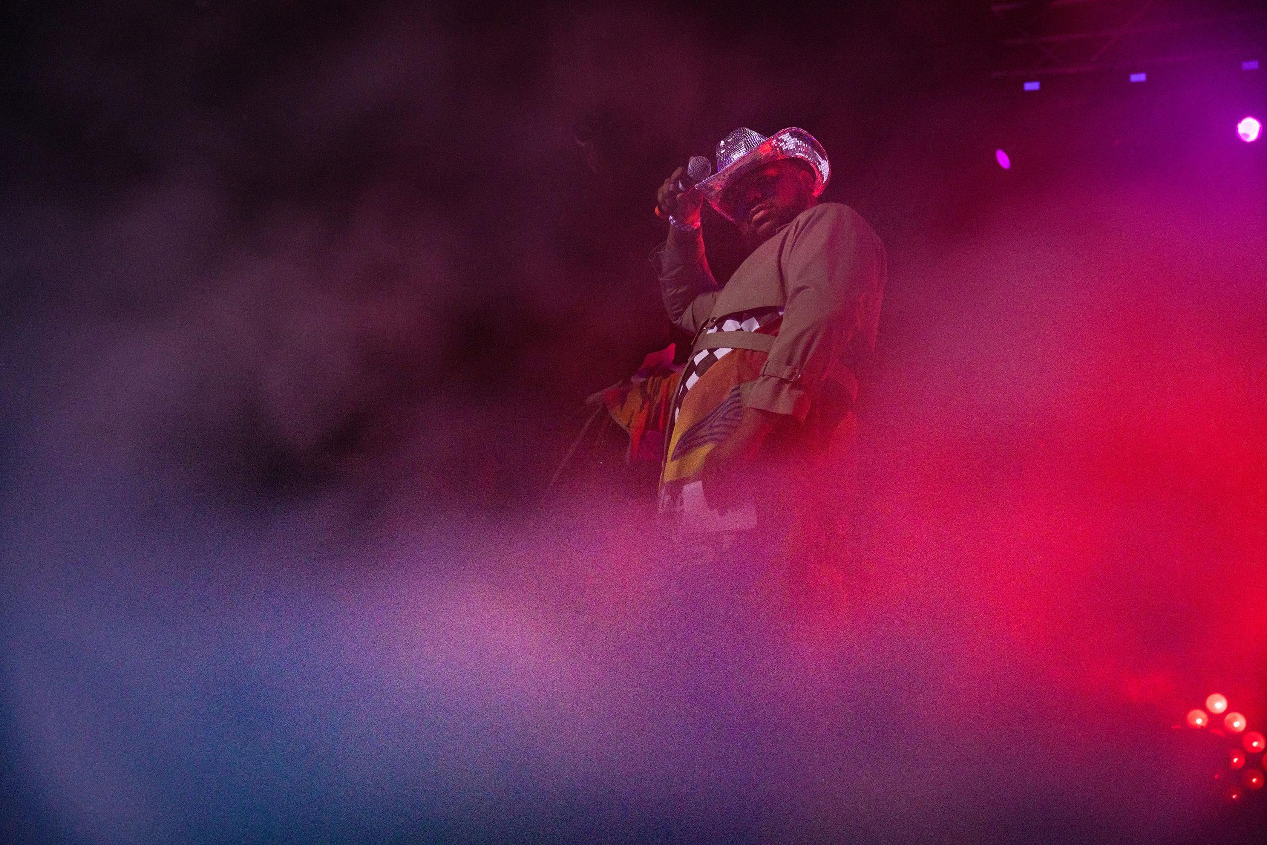 Surrounded by fog, Normal Anomaly Initiative founder Ian Haddock addresses Black Queer AF Fest attendees.