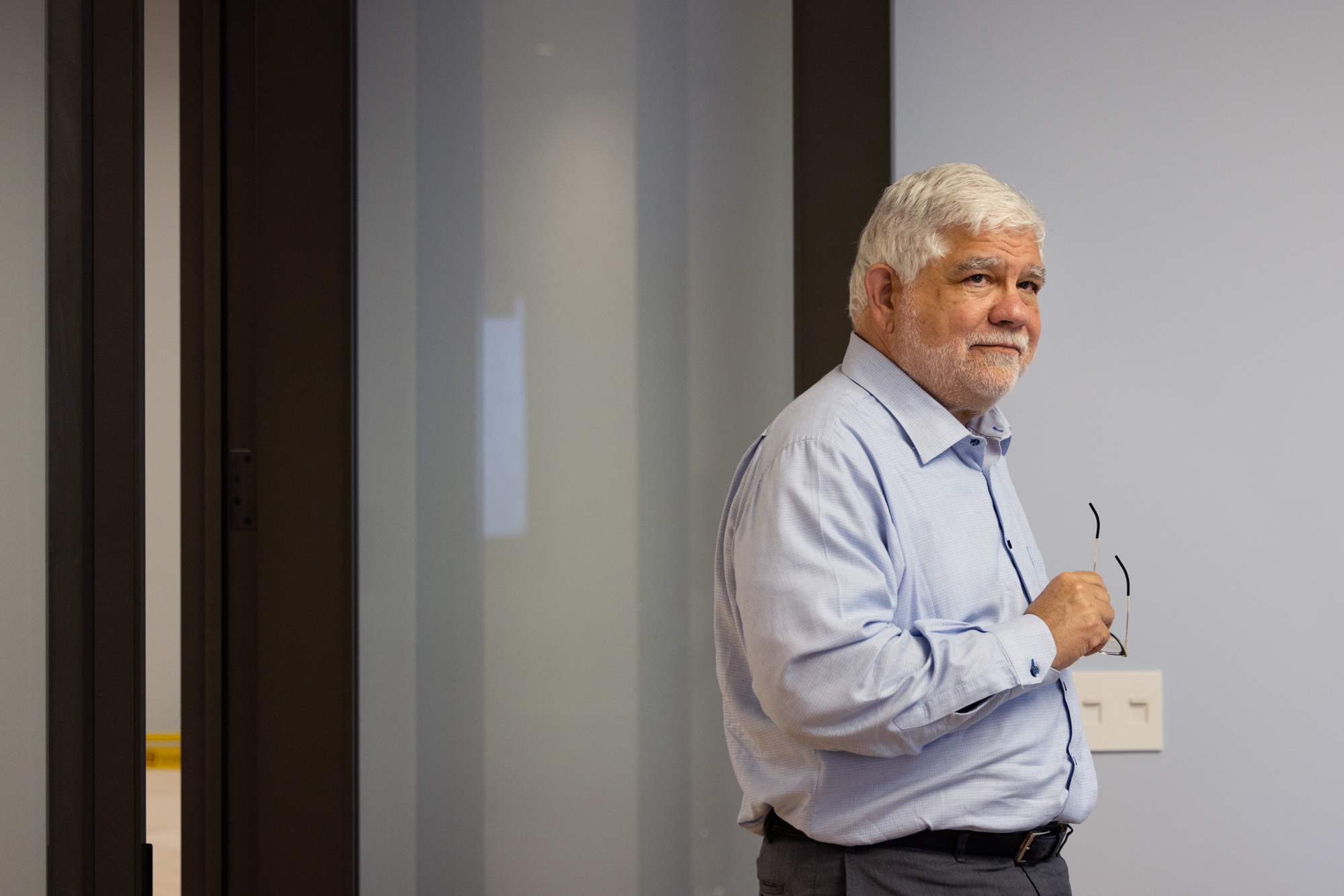 Man stands by a door