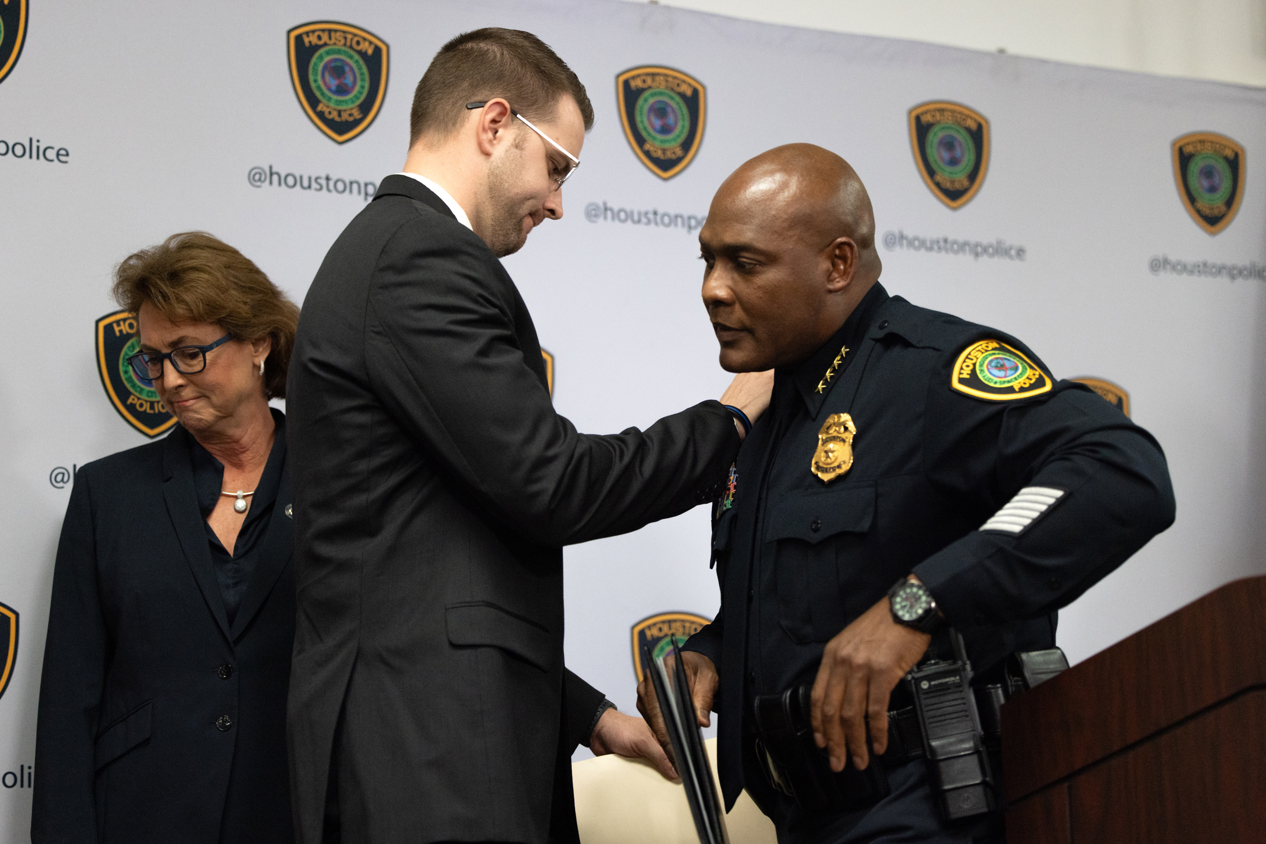 Houston Police Chief Troy Finner, at right, prepares for a press conference