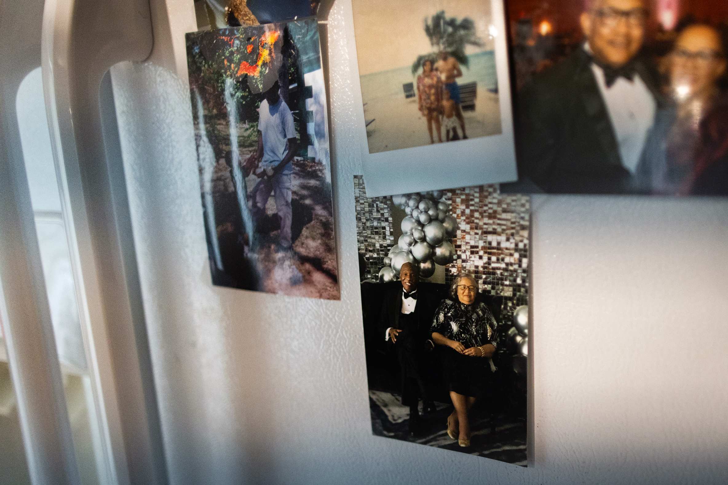 A photograph of Aaron Morris' grandparents, Richard and Hattie Mae Morris, is taped to the refrigerator in his Jefferson City, Mo. home. Aaron was raised by his grandparents after his mom, Richelle, was made a ward of the Harris County Guardianship Program when he was 7.  (Marie D. De Jesús / Houston Landing)