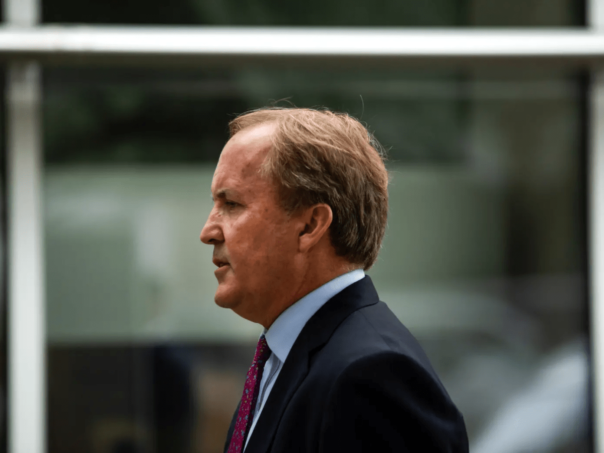A photo of Texas Attorney General Ken Paxton speaking at a press conference at the Houston Recovery Center on October 26, 2021.
