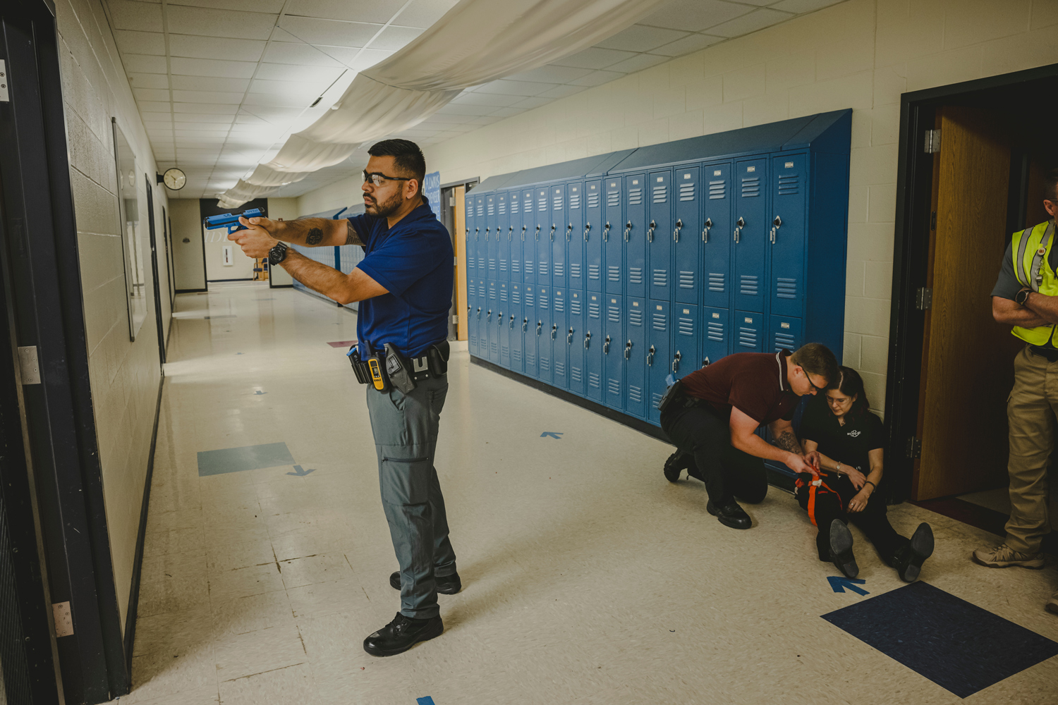 Montgomery County sheriff’s deputies and Montgomery County hospital district EMS personnel practice evacuating victims with gunshot wounds, while training together on how to respond to a mass shooting.