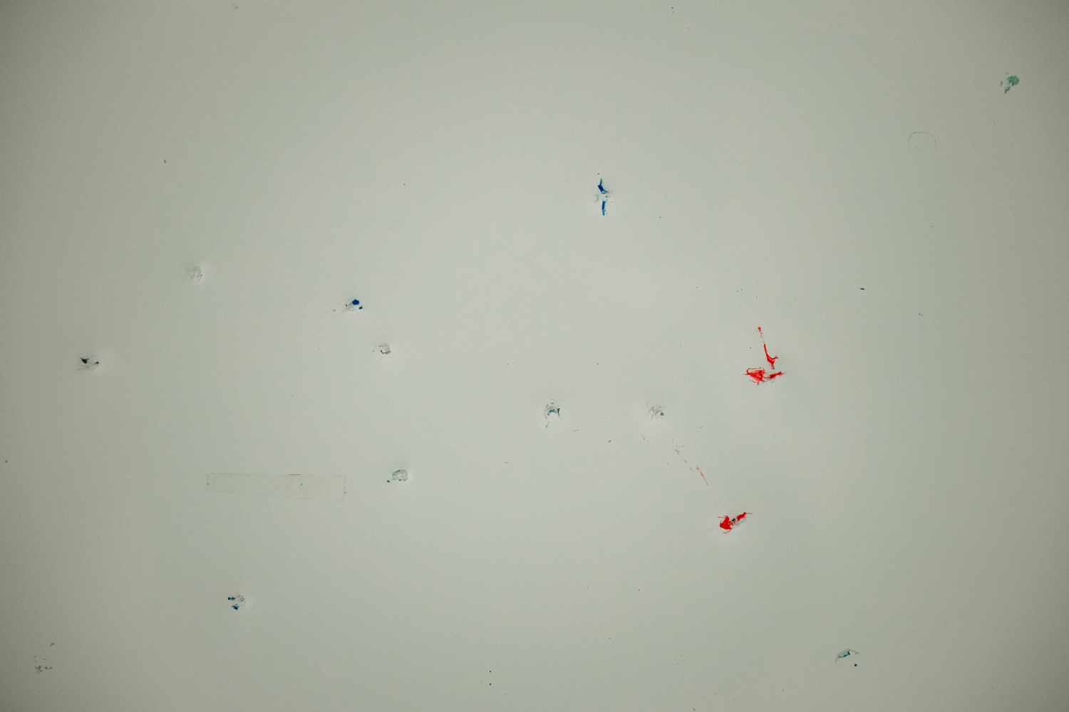 Colored marks from Simunition gun projectiles stain a wall in the former New Caney high school building that the Montgomery County Sheriff’s Office is repurposing as a training facility. 