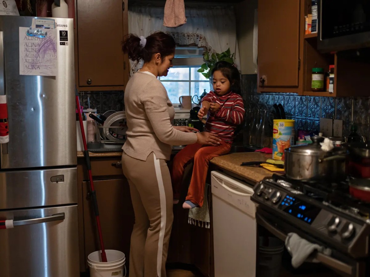 Cristina Lazo starts the daily routine of washing her daughter Alina’s hands, changing clothes and rubbing an ointment on her irritated eyes after coming home from the outside. Lazo believes the fumes from the nearby industrial sector are contributing to her 7-year-old daughter’s symptoms.