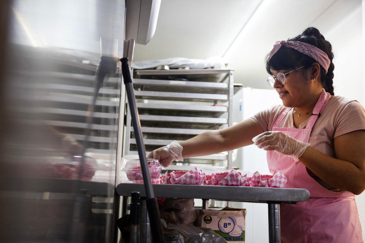 Lourdez Monjaraz decorates cakes and macaroons at Tsopelli Bakery, Thursday, March 7, 2024, in Houston.