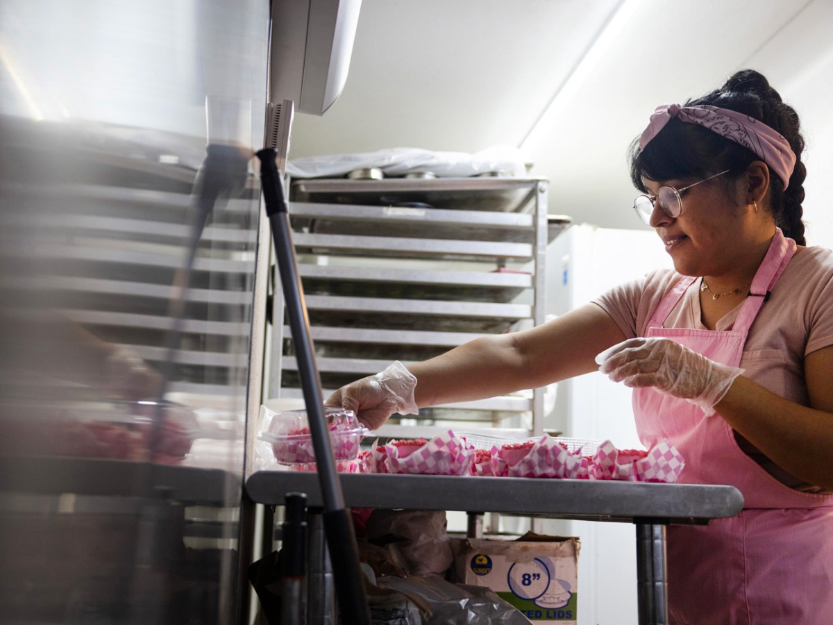 Lourdez Monjaraz decorates cakes and macaroons at Tsopelli Bakery, Thursday, March 7, 2024, in Houston.